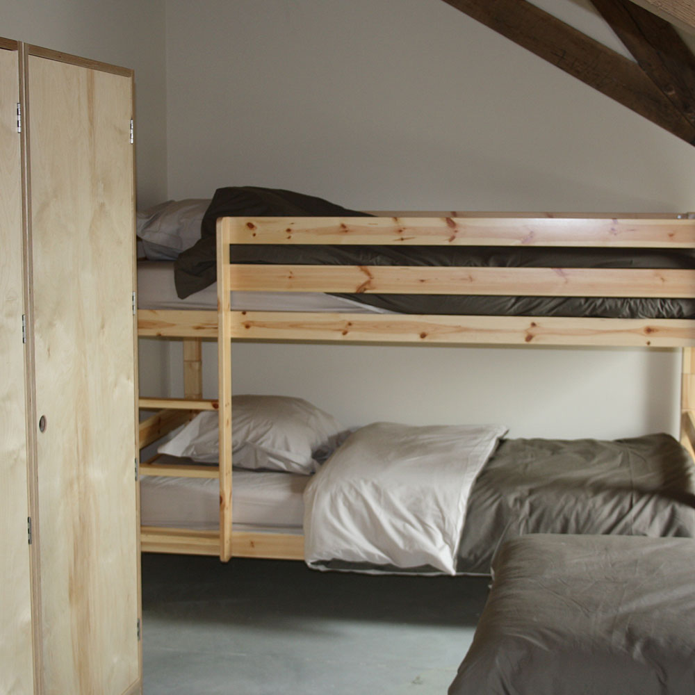 Chambre avec lits superposés du gîte de la Ferme de Forestaille